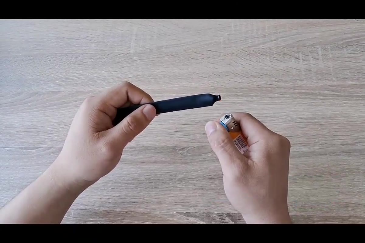 Heat-shrink tubing installation demonstration on a cable terminal